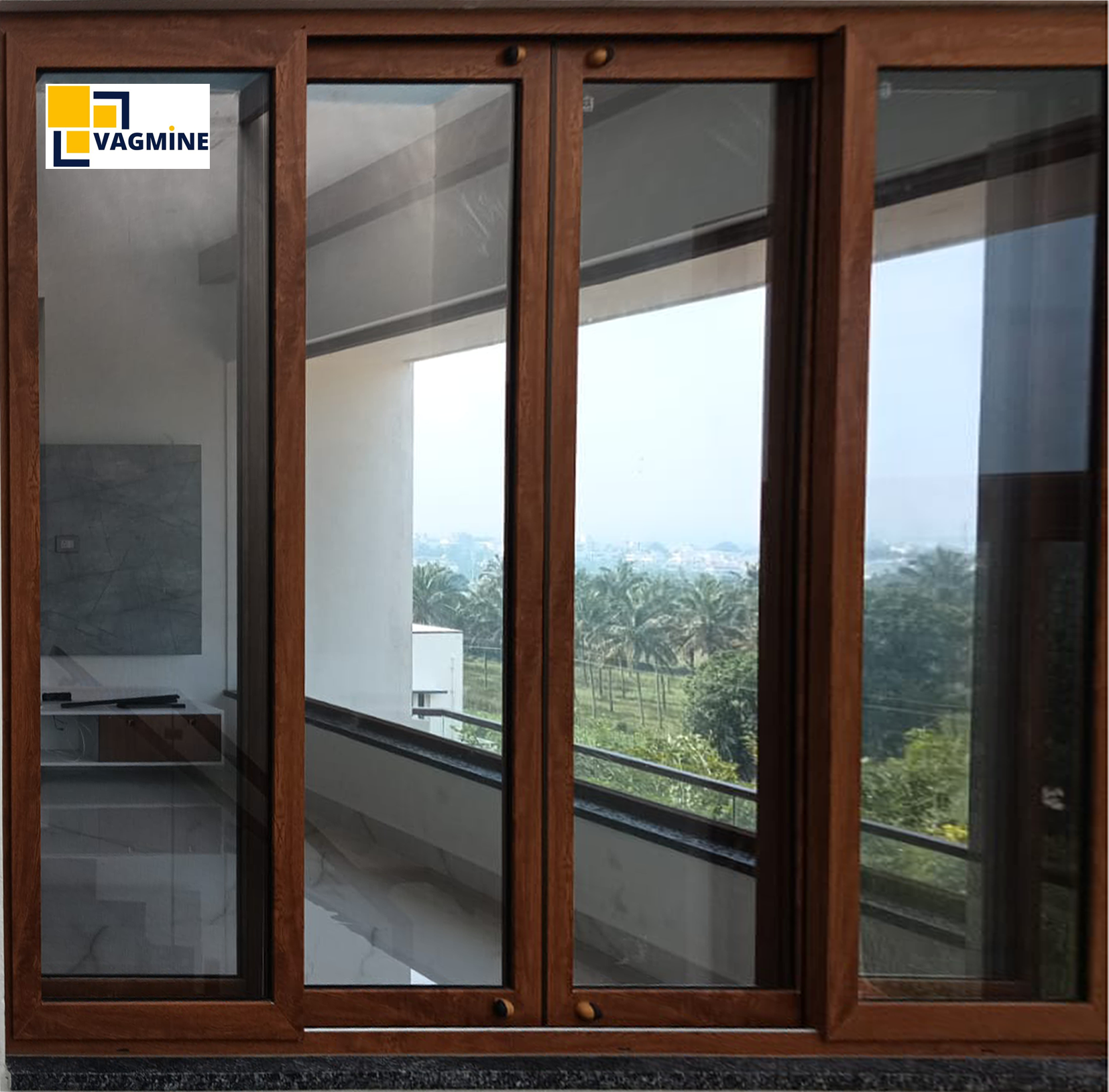 Woodgrain uPVC sliding window installed by Vagmine